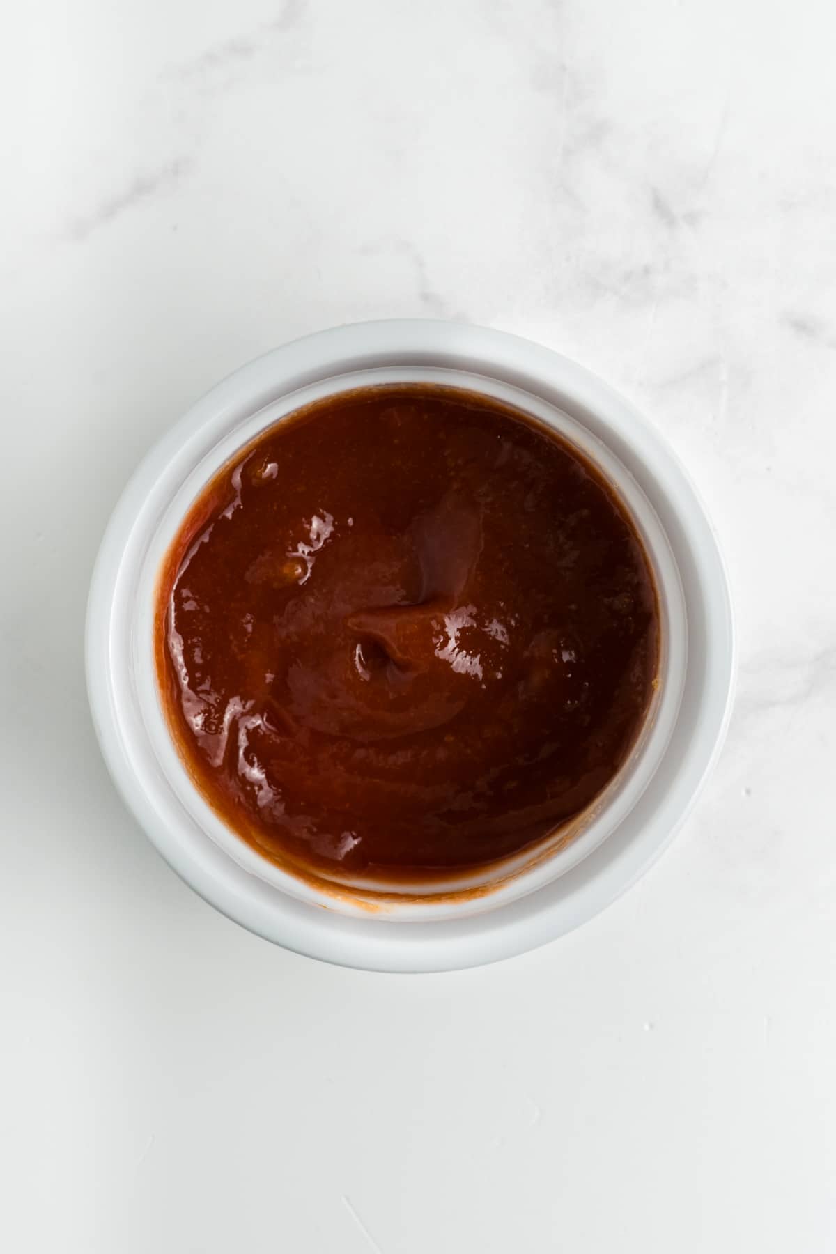 Ketchup, brown sugar, and Worcestershire sauce to a small bowl.