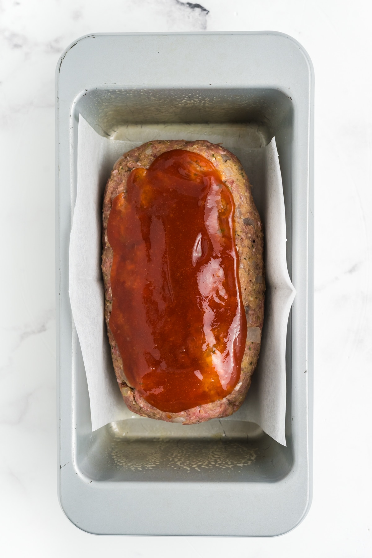 The glaze mixture on the meatloaf.