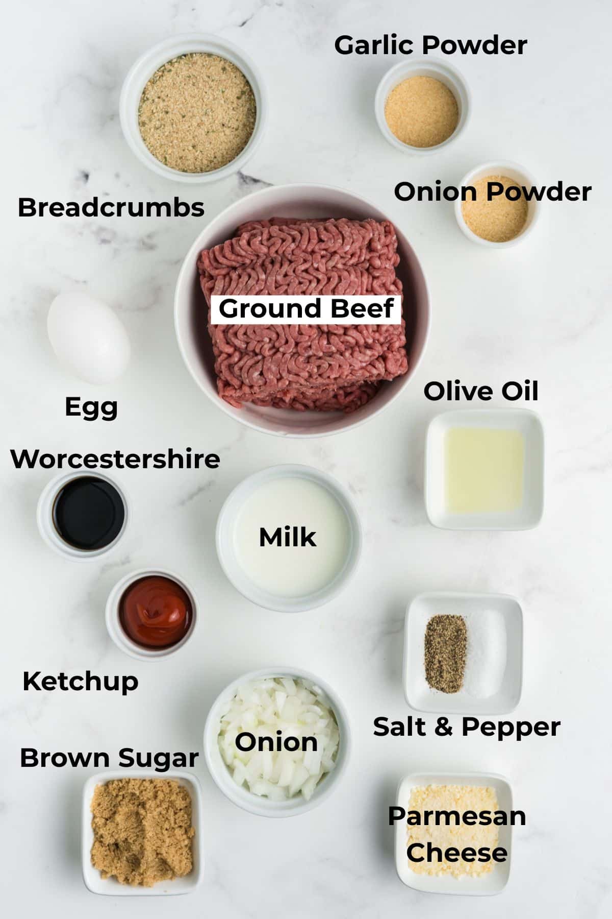 Ingredients to make this 1 pound meatloaf in bowls on a table.