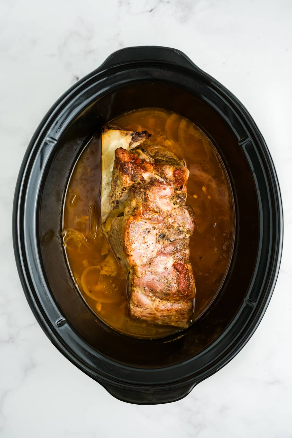 The pork cooked in the slow cooker.