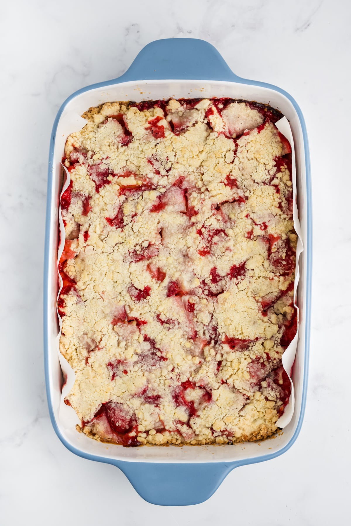 Strawberry bars baked until golden brown in the baking dish. 