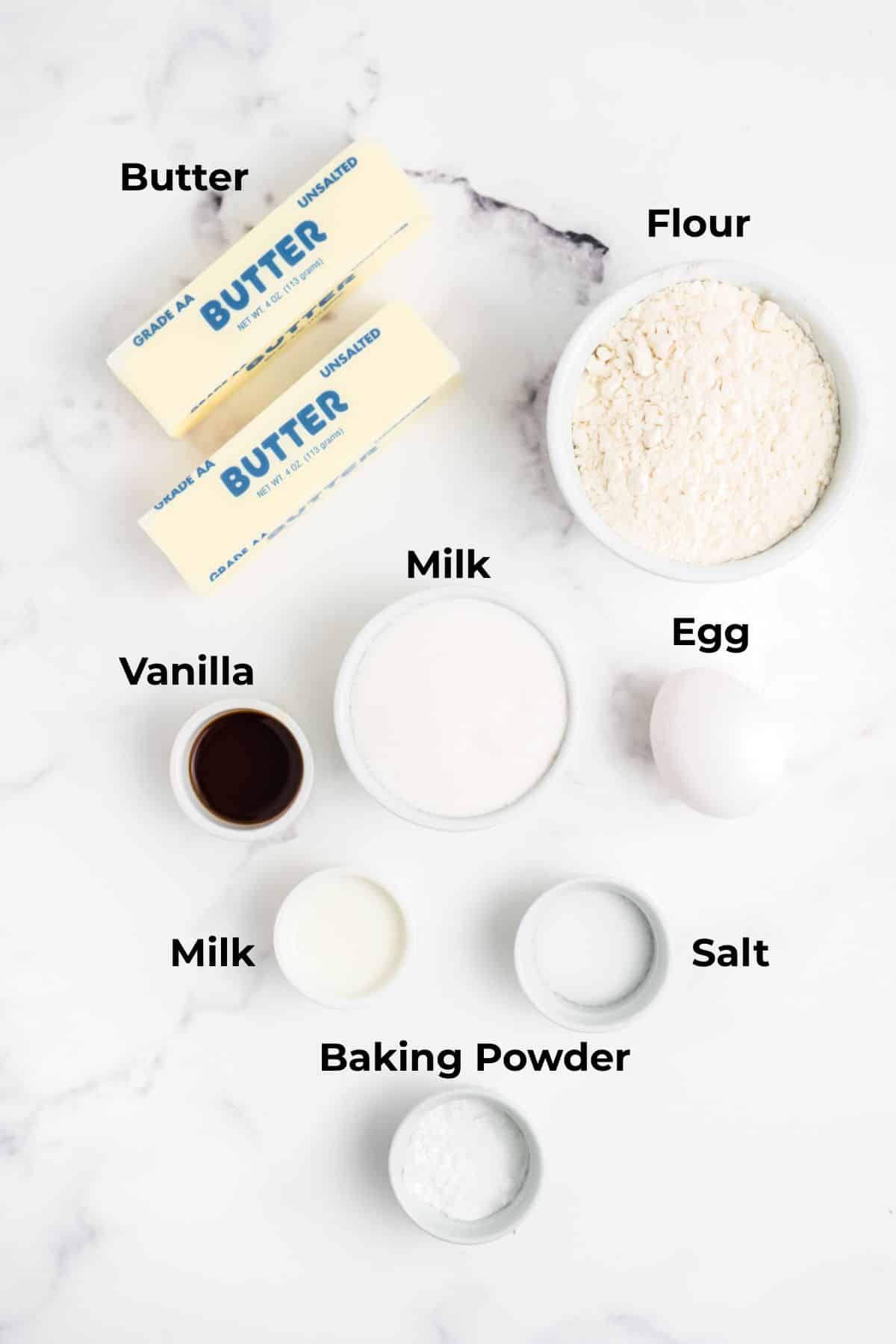 Ingredients to make these cookies in bowls on a table.
